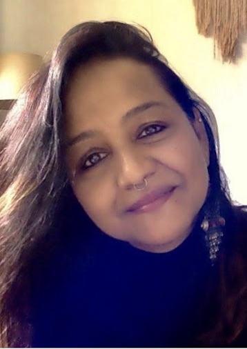 Portrait of the author, a Grief Circle holder, writer and artist